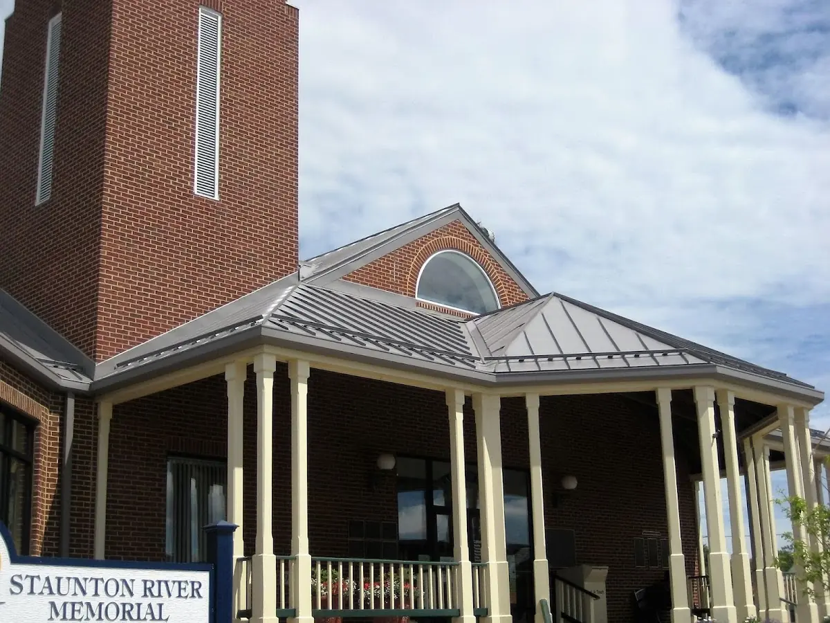 Skilled roofing craftsmen working on a residential roof in Marion Center